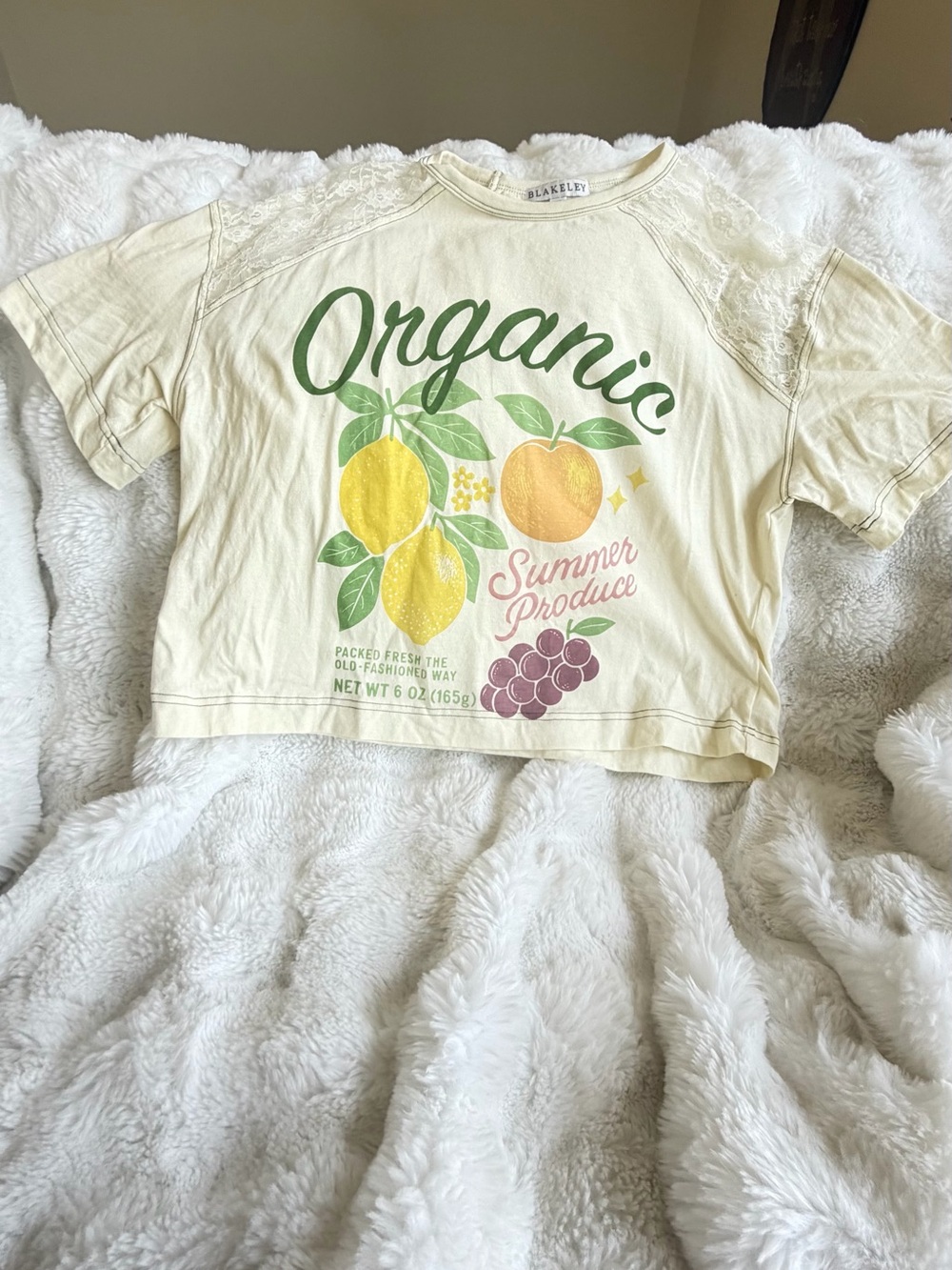 Blakely oversized XS Organic Summer Graphic tee with lace sleeves.
